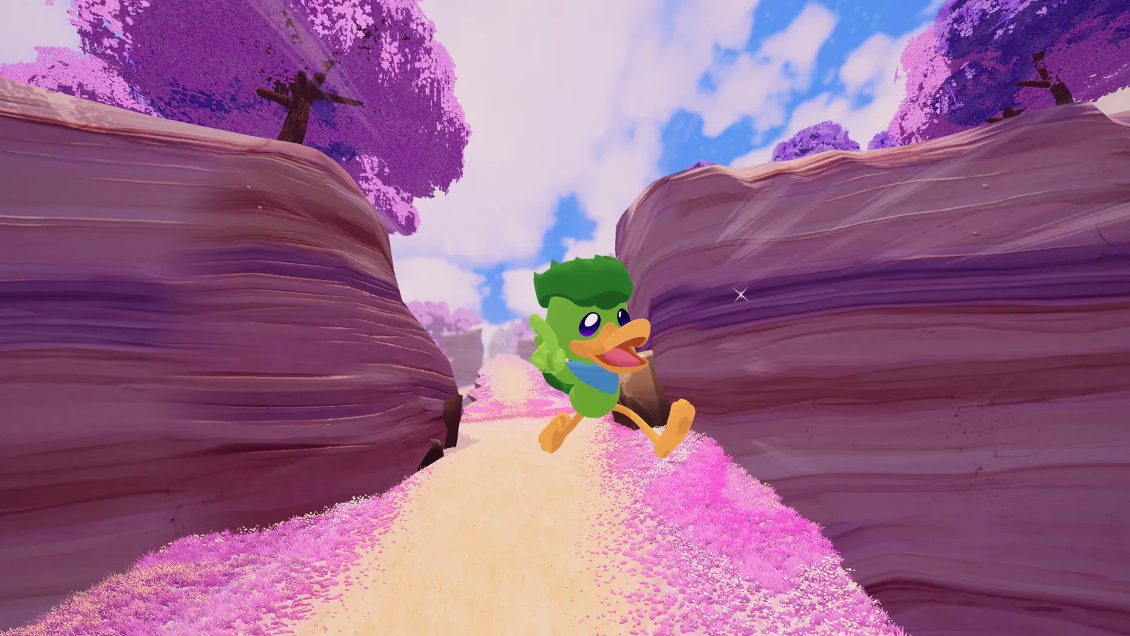 A narrow ravine run through pink grassland
